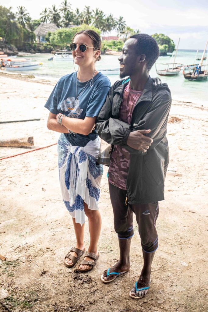 People on the beach, Zanzibar smiling